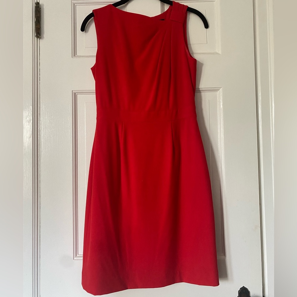 Flattering, comfortable little red dress. Semi formal.